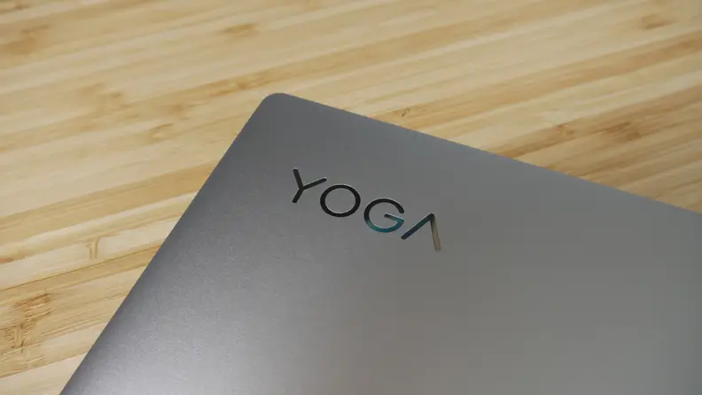 Yoga brand logo on the outside of a Lenovo Yoga 9i