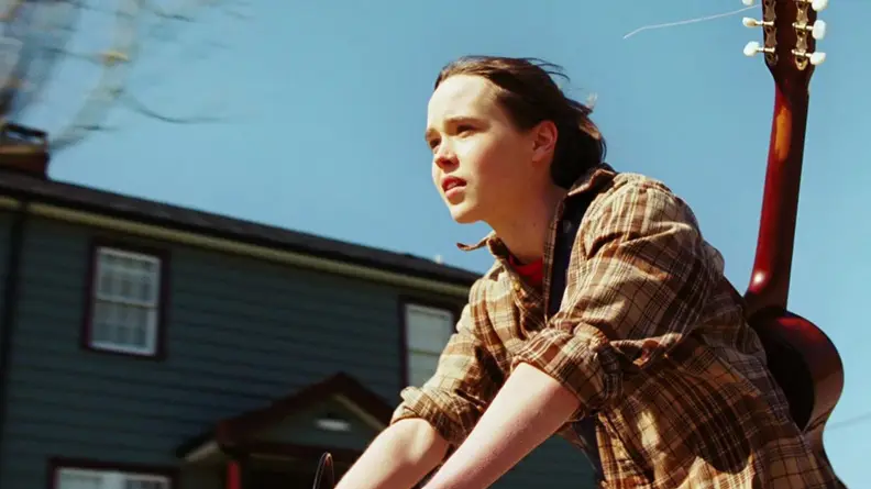 Juno (Eliot Page) riding a bike.