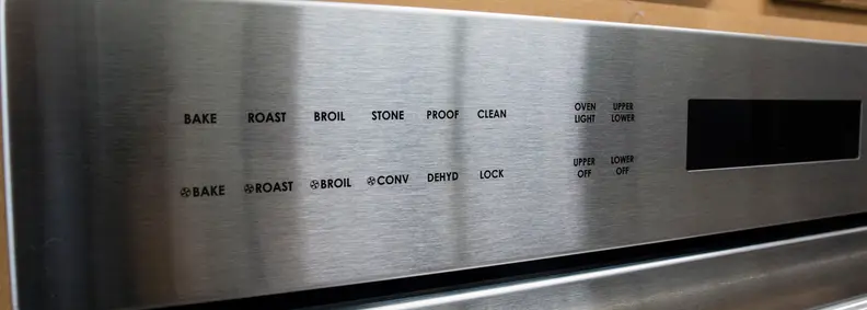 Oven options can be found on the left section of the control panel. Photographed at Boston Appliance in Woburn, MA