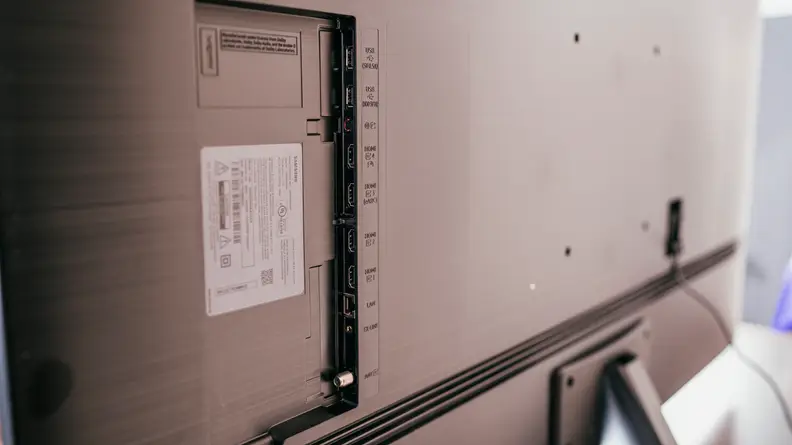 The Samsung QN85A's connectivity options, as seen from behind the TV's panel