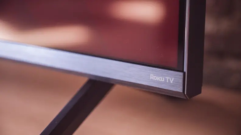 The Roku TV logo, as seen on the bottom of the TCL 6-Series panel