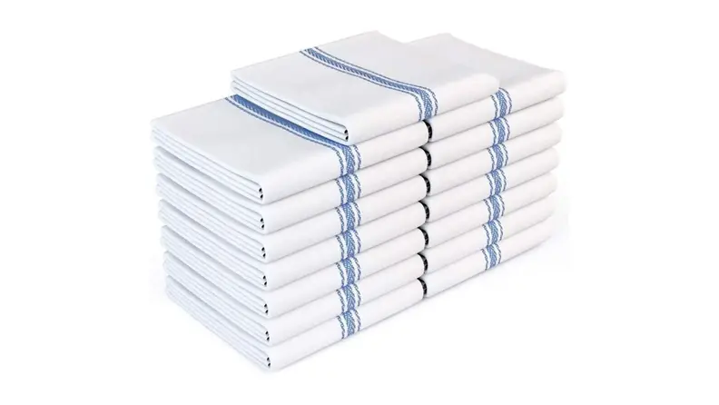 A stack of white kitchen dish towels with dark blue stripes on the outer edges.