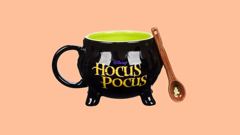 A hocus pocus mug on an orange background