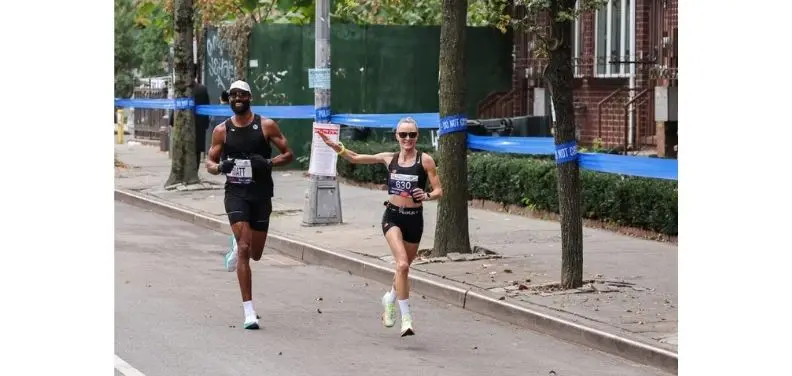 Matt James running a race wearing the Nike Vaporfly sneakers