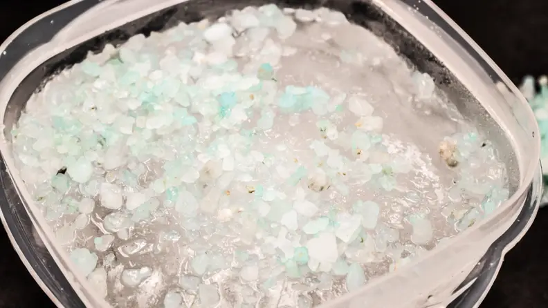 The commercial ice melter took longer to get started than the table salt.
