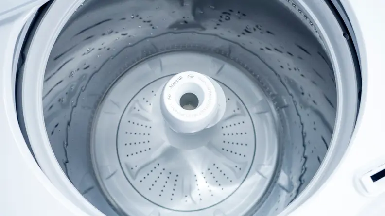 This washing machine has a pole agitator