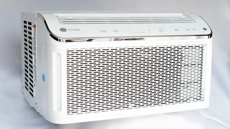 The white GE Profile PHC08LY, the best window air conditioner, is pictured in three-quarters profile.