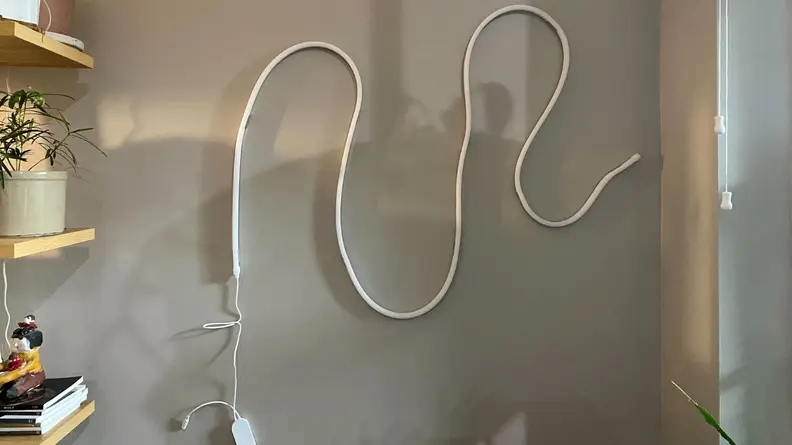 Govee Neon Rope Lights in the off position on the wall