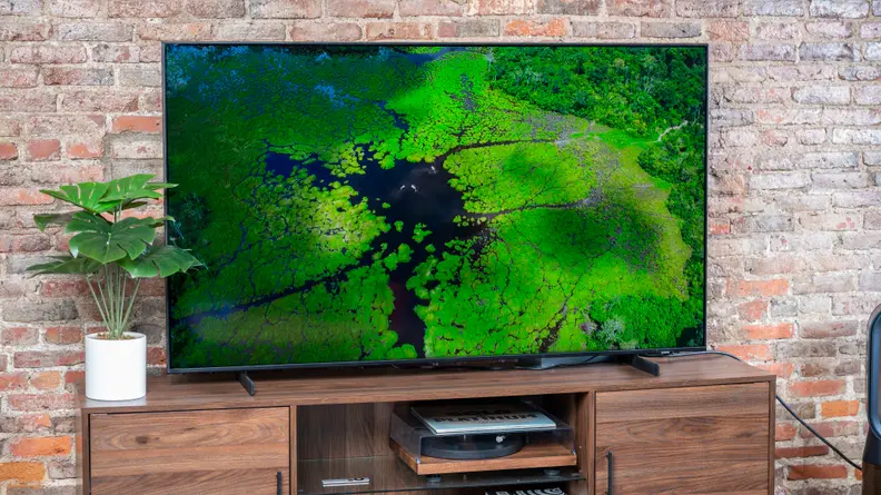 The Samsung AU8000 displaying 4K content in a living room setting