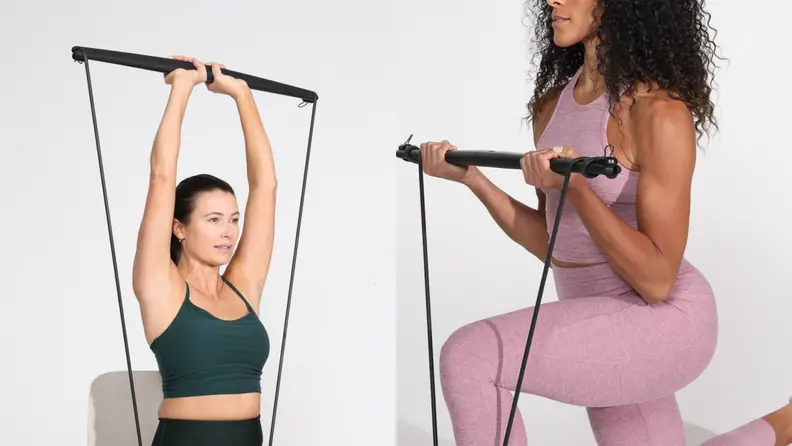 Women using the Bodygym for tricep presses and bicep curls.