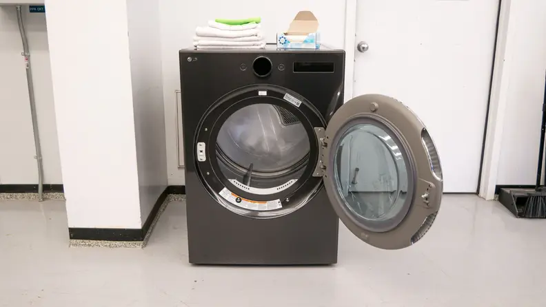 The LG DLEX6700B Dryer with its door open.