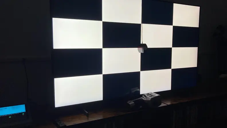 The Samsung Q60B displaying an ANSI checkerboard pattern prior to contrast testing