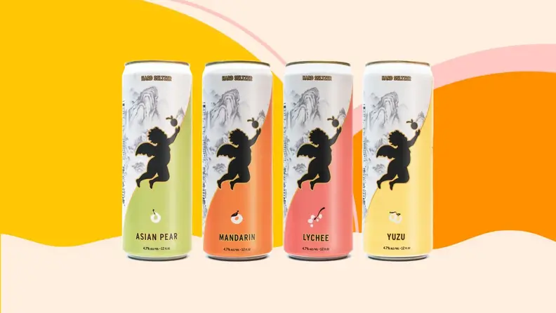 Four Nectar seltzer cans in varying flavors on a colorful background.