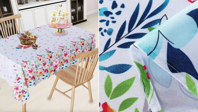 Product shot of white and multi-colored floral tablecloth.