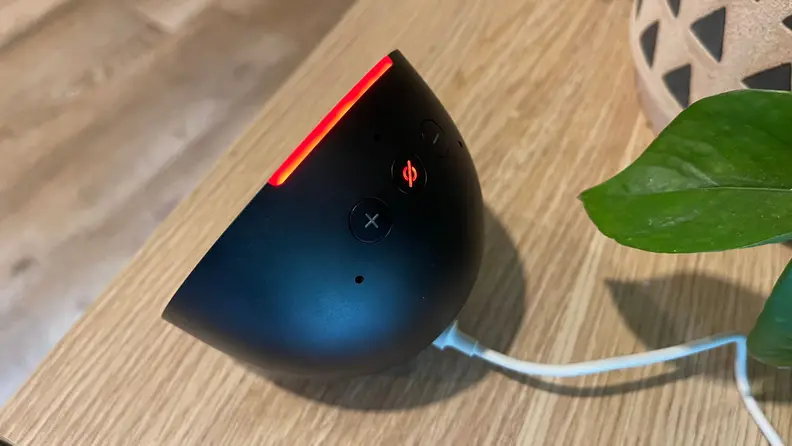 The Echo Pop Speaker with the mic mute button enabled