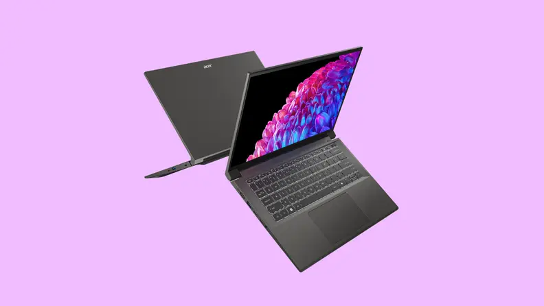 Two Acer Swift X 14 laptops floating in mid-air while back-to-back.
