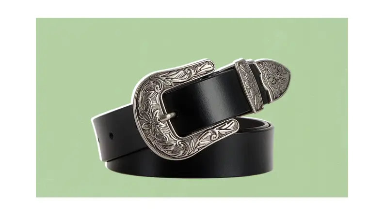 A belt with a large, western-style buckle.