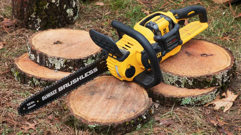The best chainsaw, the DeWalt FlexVolt DCCS670T1, is shown outdoors