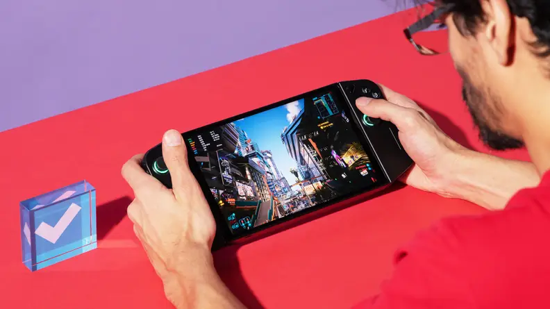 A man playing the Lenovo Legion Go.