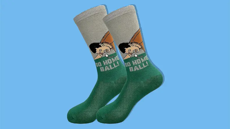 Balanced Co. “Happy Gilmore” socks on a blue background.