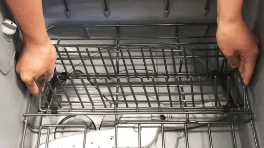 An animated gif of one of our lab techs adjusting the sliding rows of tines.