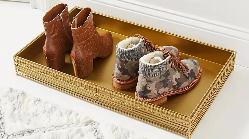 This beautiful metal boot tray is as stylish as they come.