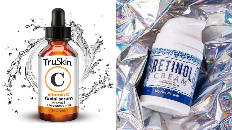 On the left: An orange dropper bottle of serum with water all around it. On the right: A small pump bottle of retinol laying on holographic tissue paper.