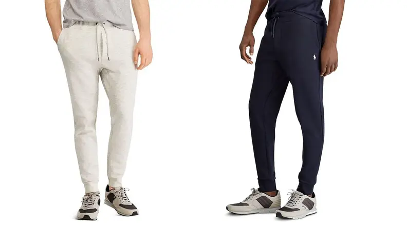 A pair of models pose in stylish Ralph Lauren sweatpants.