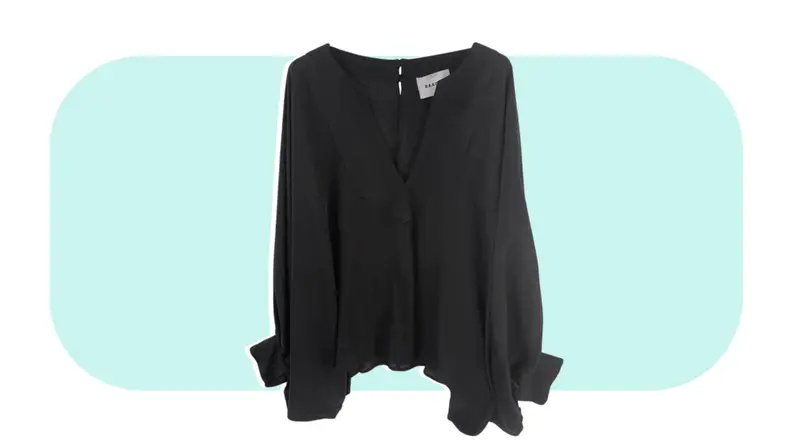 Product shot of a black blouse.