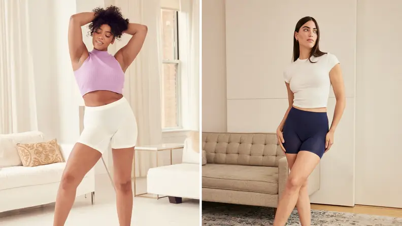 A model wears white shorts, another wears navy shorts.