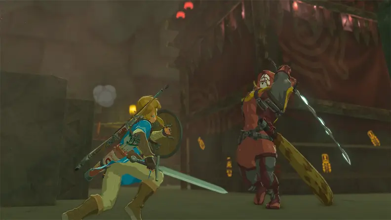 Link battles a Yiga ninja in an underground hideout.