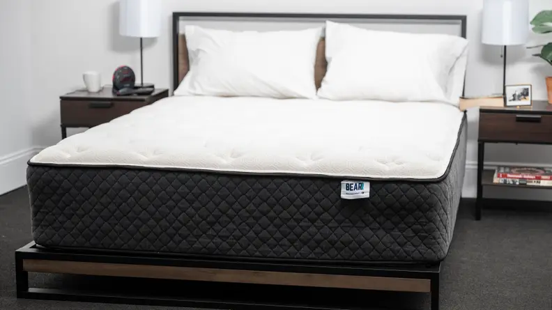 bear mattress on bed with pillows