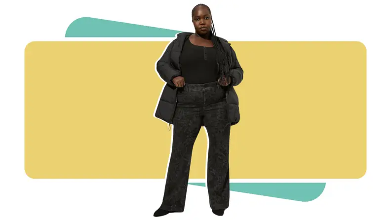 A woman wearing Torrid jeans.