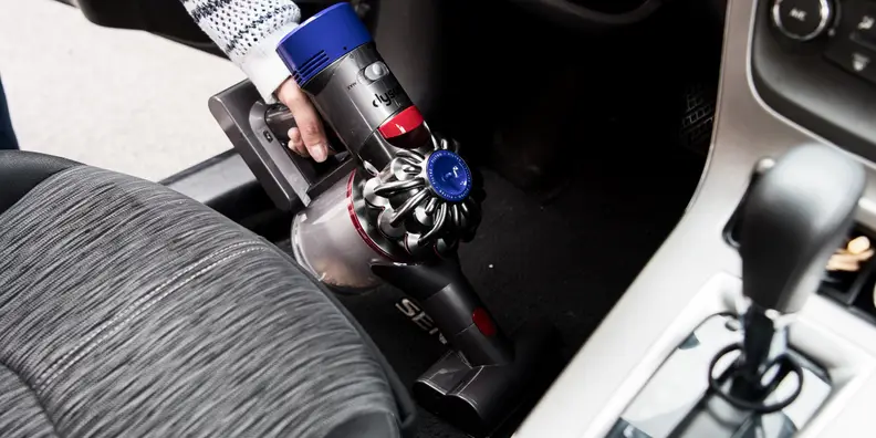 The Dyson V8 Absolute cleaning a car, during testing to find the best cordless vacuum