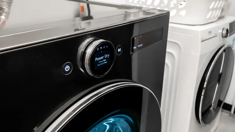 The The LG DLEX6700B has a circular dial with an LED display on it.