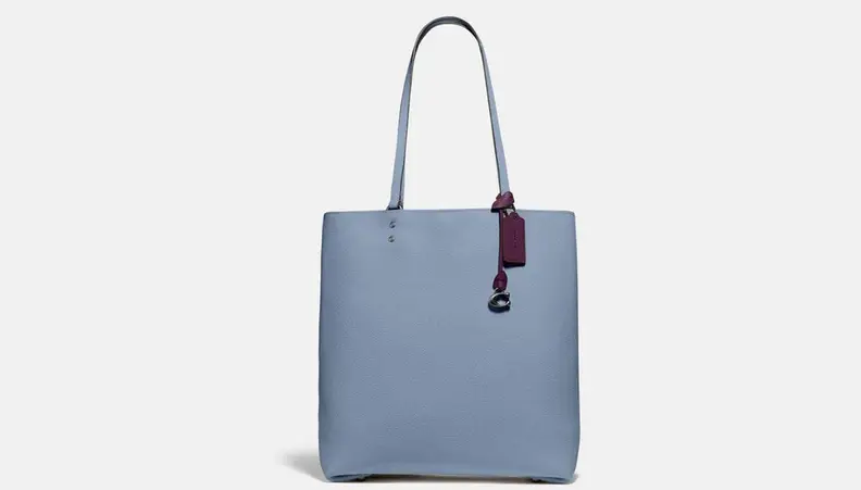 A dusty blue leather purse