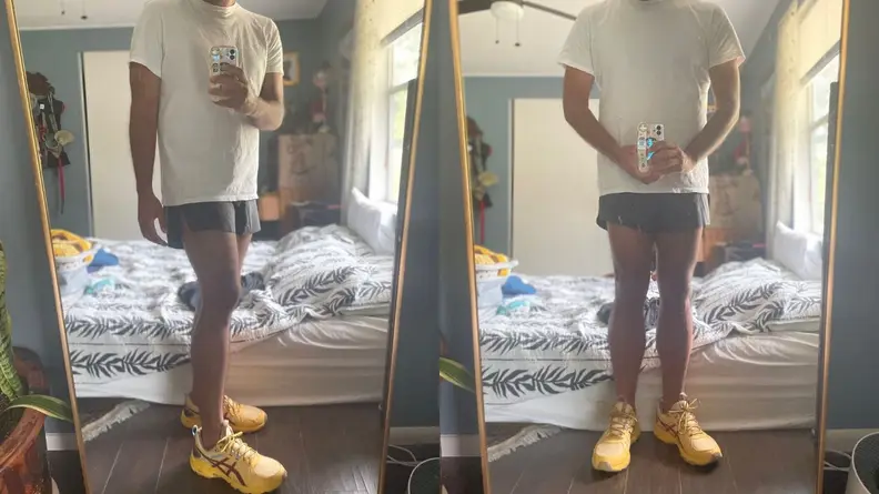 man wearing Lululemon short shorts in mirror