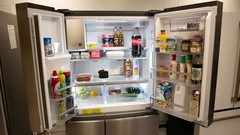 Food and drinks inside of the Frigidaire Gallery Quattro GRQC2255BF 4-Door French-Door Refrigerator.