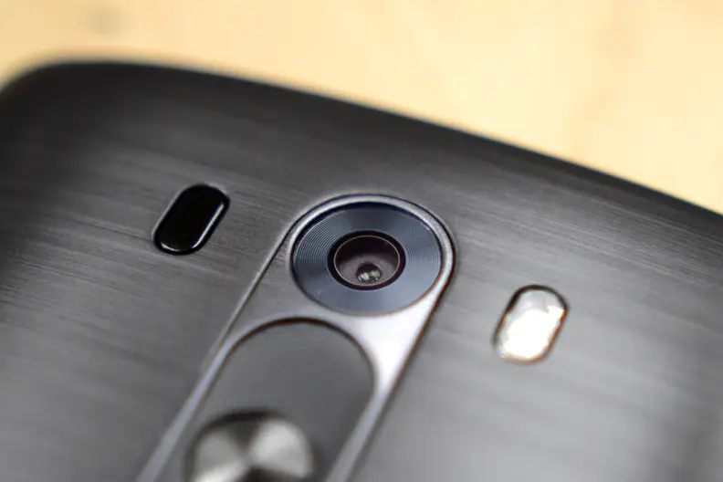 The LG's laser emitter sits beside the lens and provides the camera with depth information to speed up focusing.