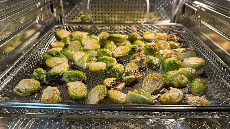 Cooked brussel sprouts inside the GE Profile smart oven.