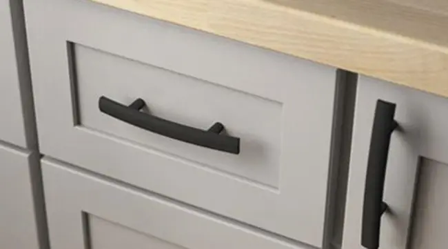 Matte black hardware is modern. If you ever get tired of it, it's not expensive to change out cabinet pulls.