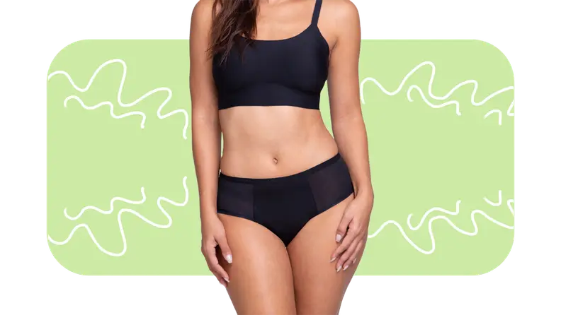 Model wearing solid black sports bra and hipster underwear set.