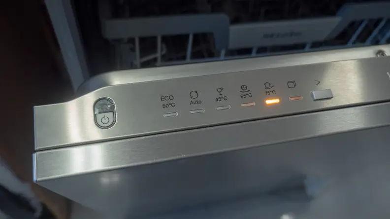 Miele dishwasher controls showing the heavy cycle for pots and pans selected.