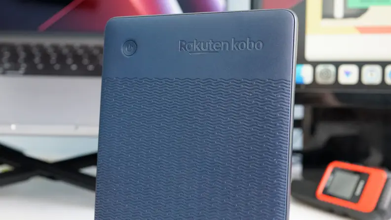 The textured, back cover of an e-reader.