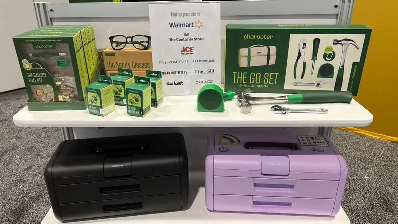 Assorted Character kits sitting on shelf above two toolboxes on a shelf at the IHS Chicago Awards 2024.