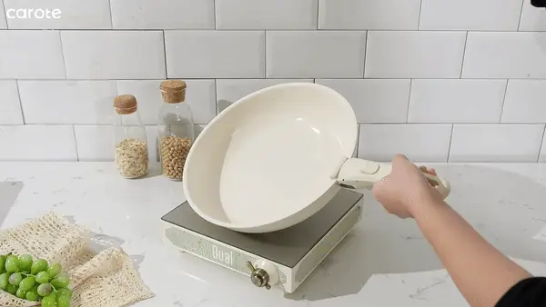 This nonstick Carote cookware set comes with detachable handles for easy stacking.