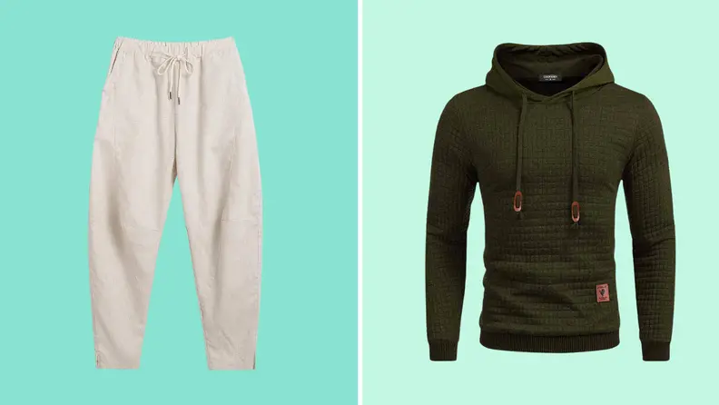 Off-white linen pants, and a green hoodie.
