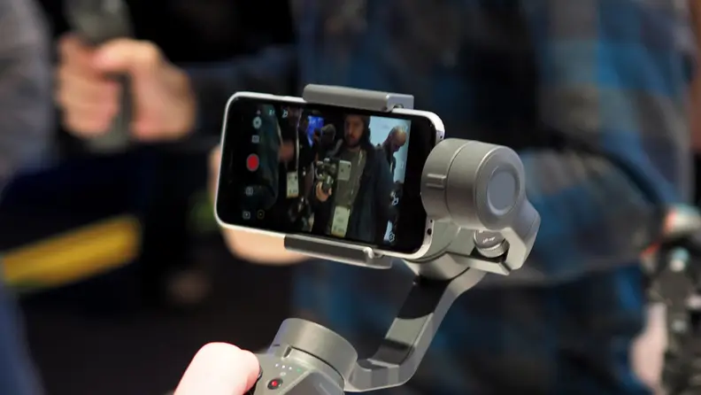 The DJI Osmo 2 stabilizer is just $129.99 but it is an incredible gimbal for your phone.