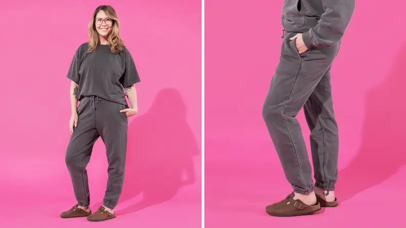 The author is seen in the Elwood Core Tee and Sweatpant in shades of gray.