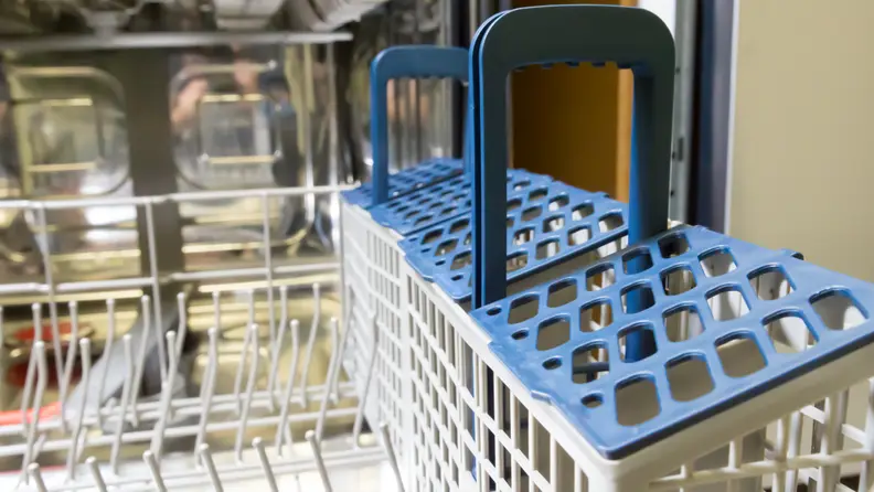 Cutlery can go into the two-piece basket, or on the third rack